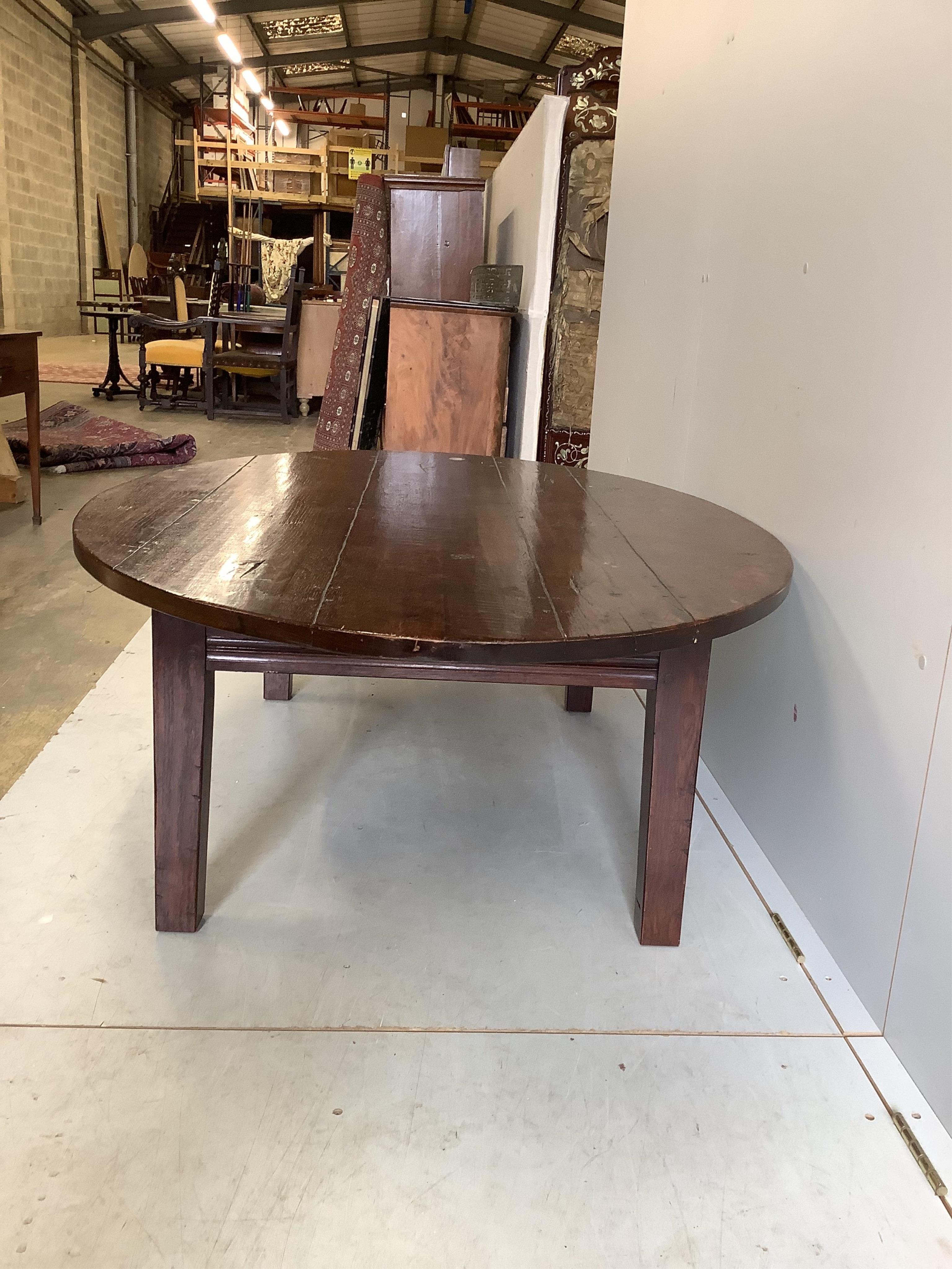 An 18th century style oval oak coffee table, width 146cm, depth 100cm, height 50cm. Condition - good